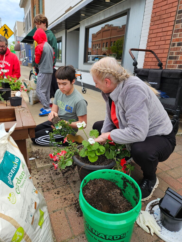 Working hard at planting the flowers