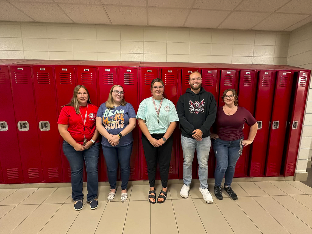 The newest staff at WF standing in the hall