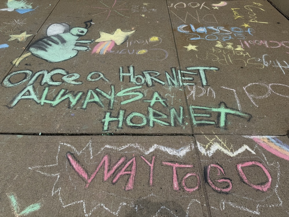 Childrens art in chalk on sidewalk