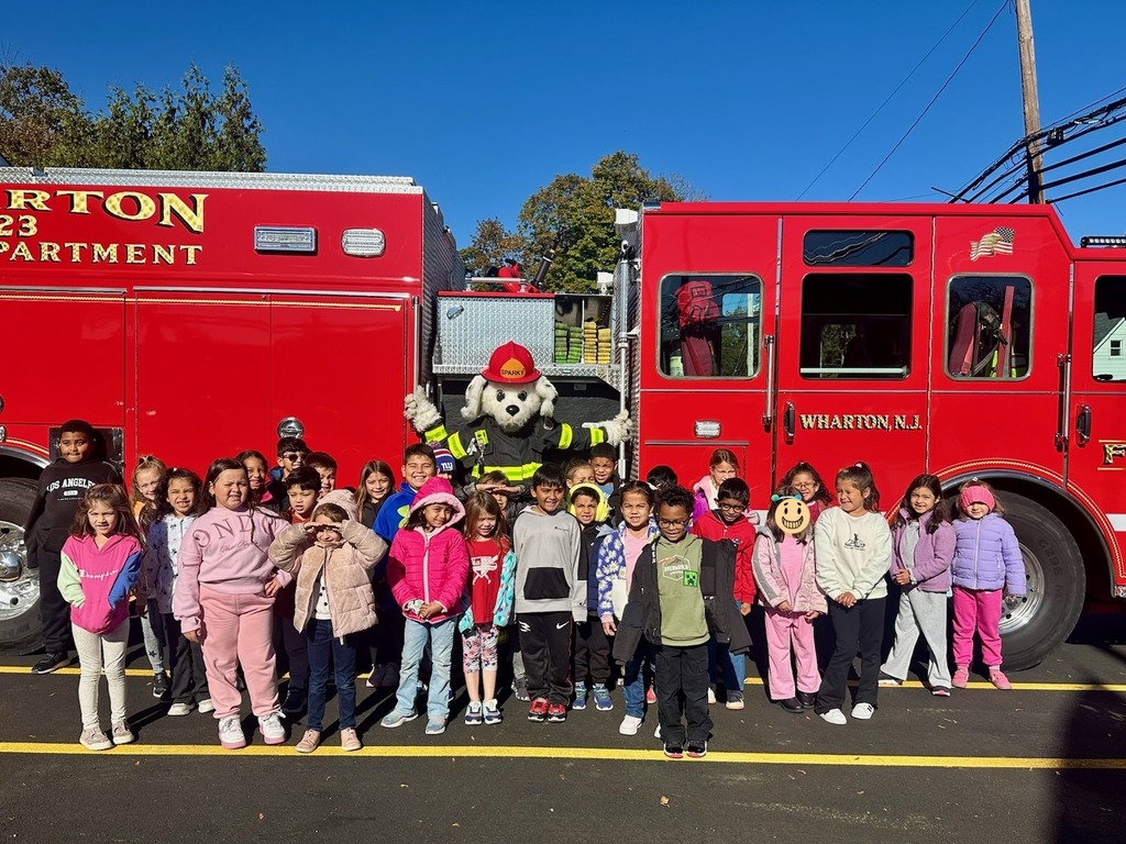 kids in front of fire truck