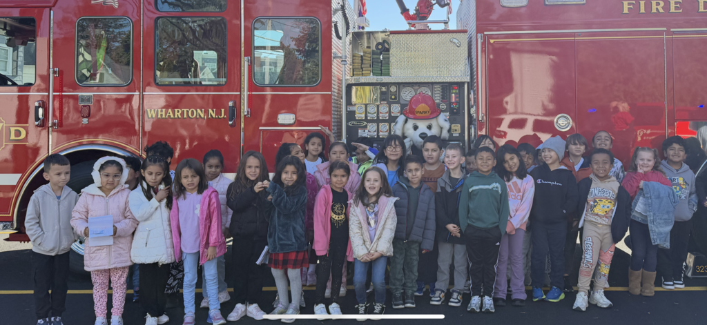 kids in front of fire truck