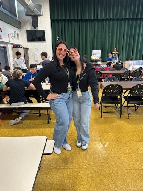 two people in black shirt and jeans