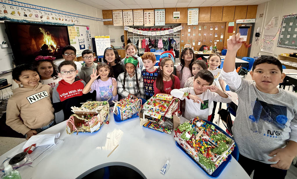 kids making gingerbread houses
