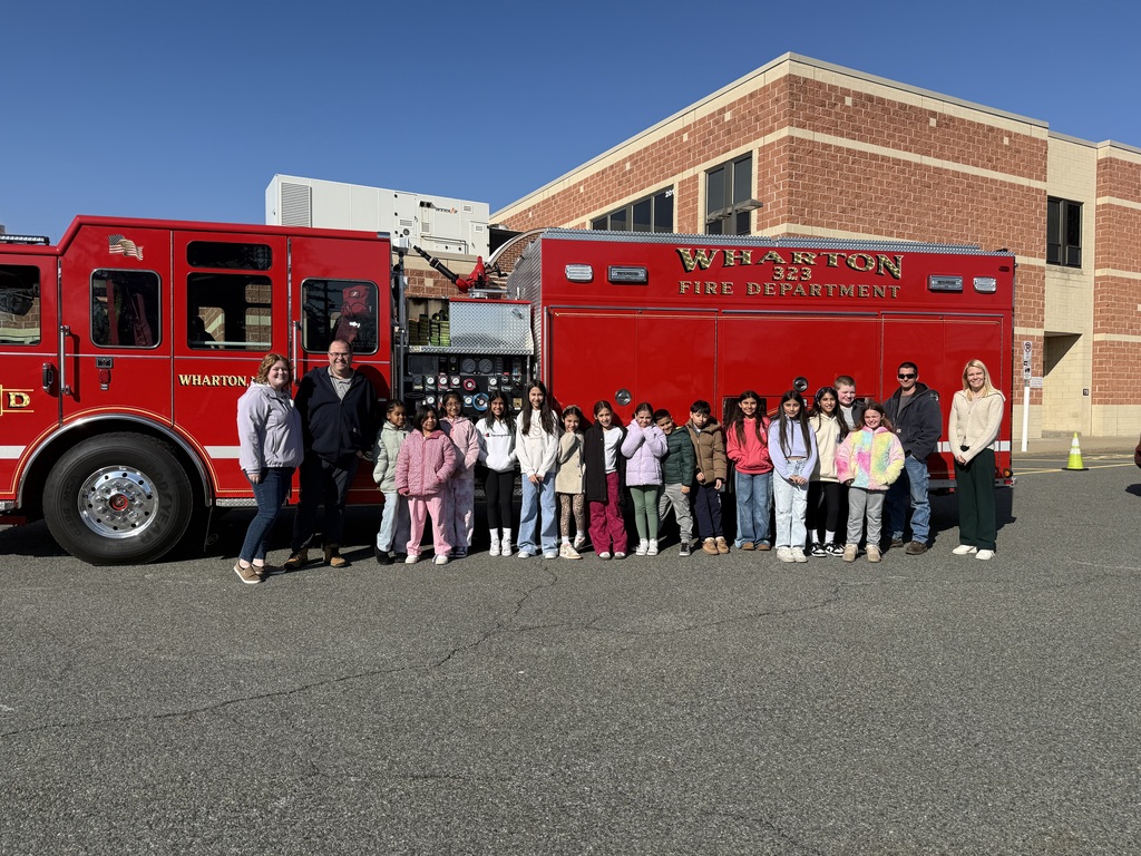 kids in front of fire truck