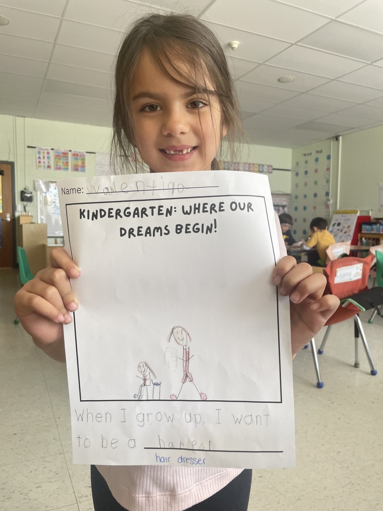 student holding a sign