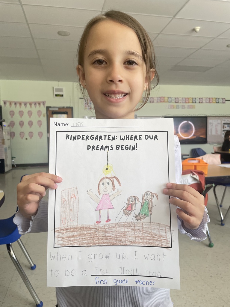 student holding a sign