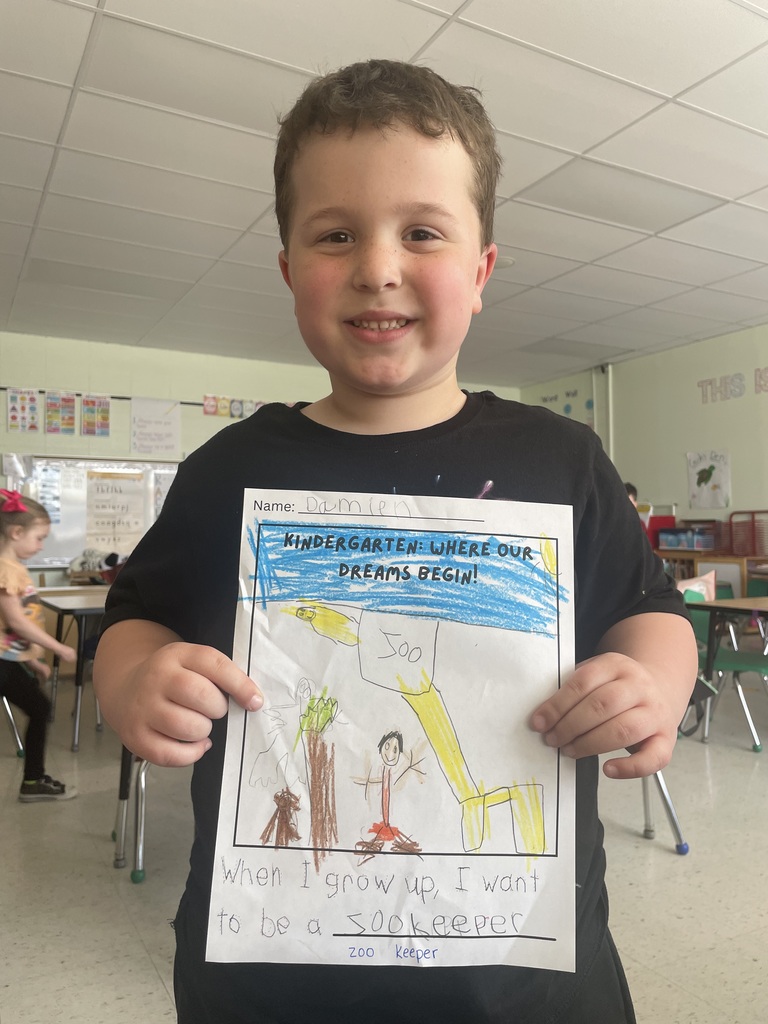 student holding a sign