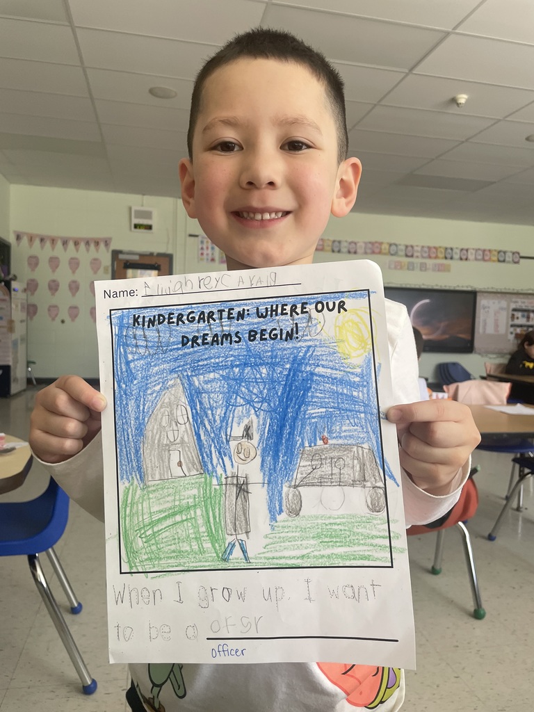 student holding a sign