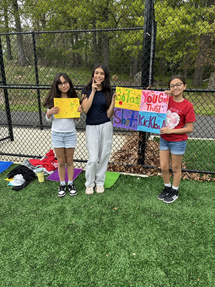 kids holding signs 