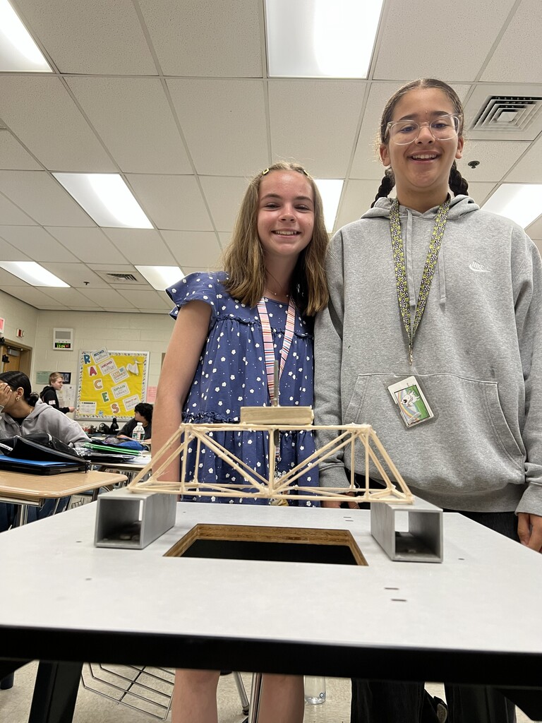students with wooden bridge