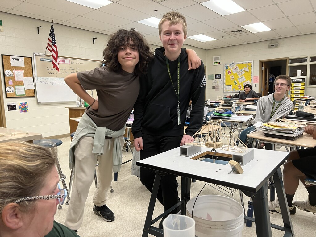 students with wooden bridge