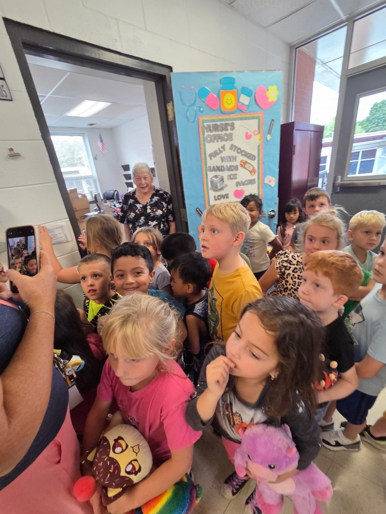 Nurse Bonnie helping Kindergarten find the bear!