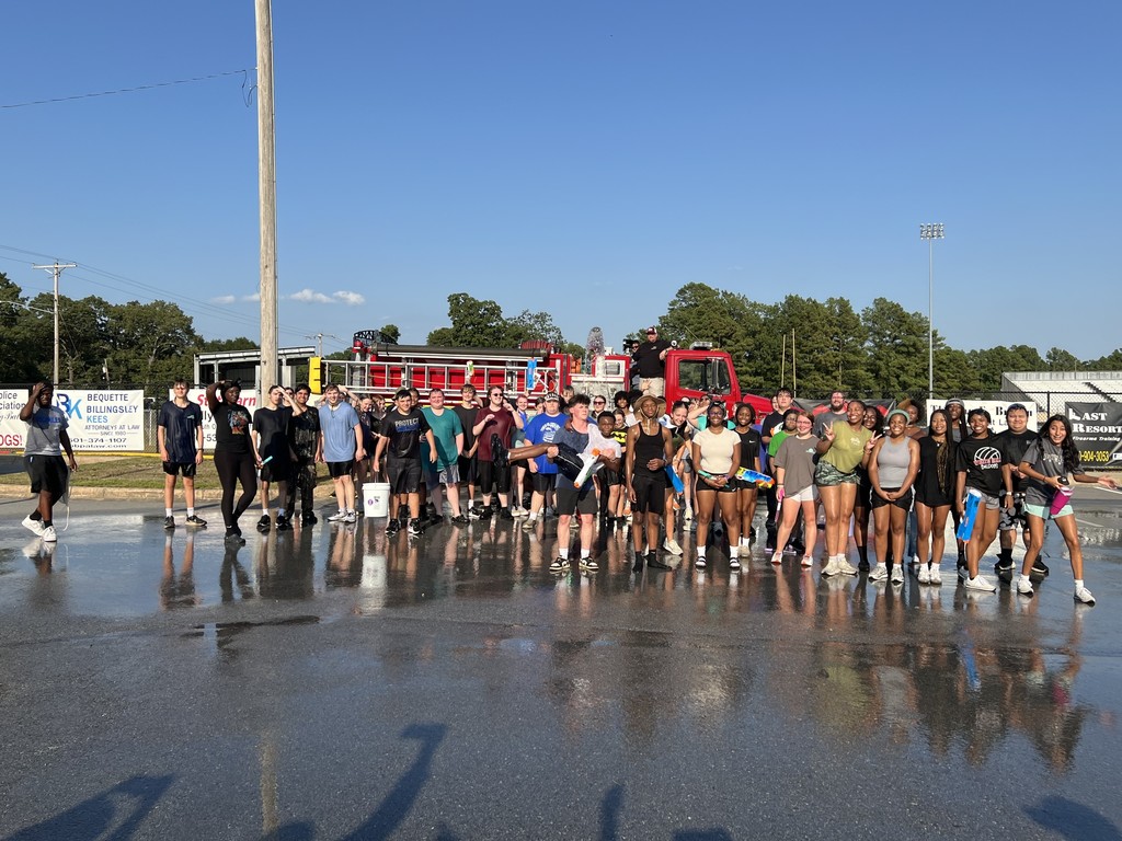 The band got soaked thanks to a visit by the White Hall  Fire Department!