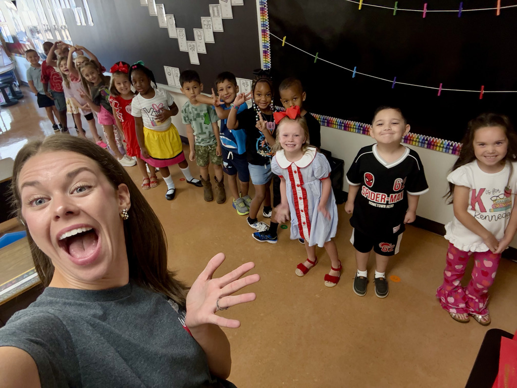 Kindergarten cuties touring the school
