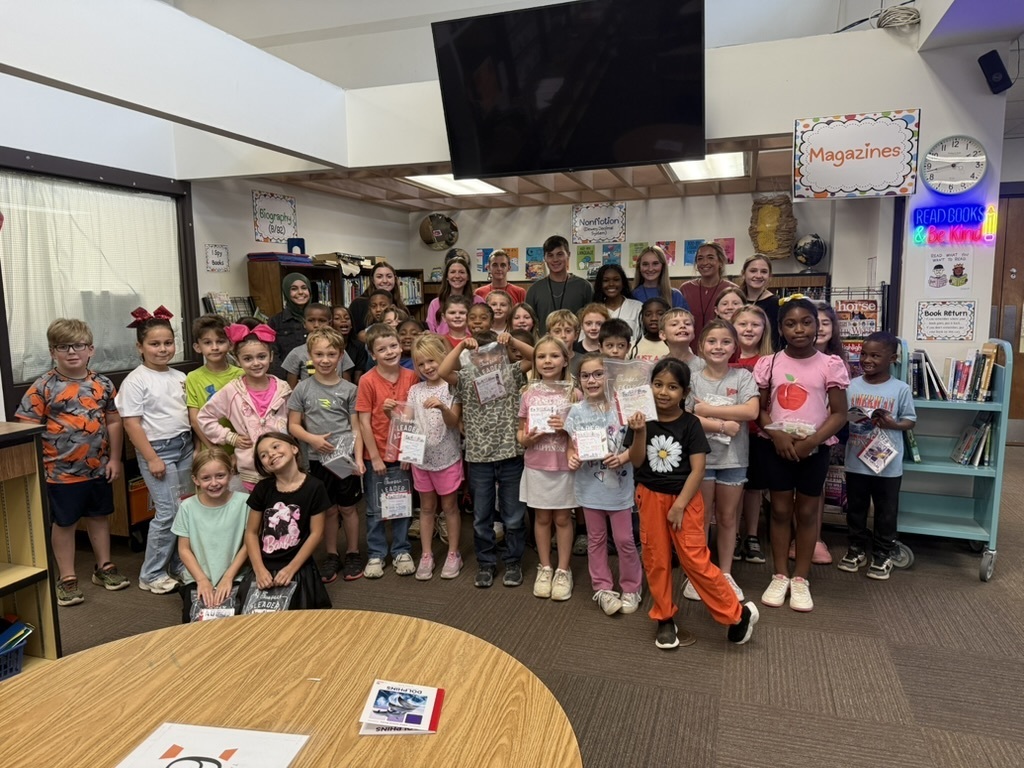 The WHHS Chick-Fil-A Leader Academy members donated books to our elementary school students and read to them.