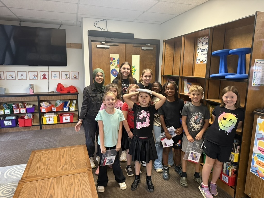 The WHHS Chick-Fil-A Leader Academy members donated books to our elementary school students and read to them.