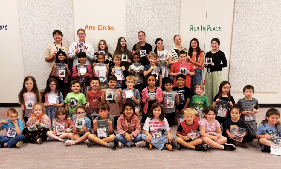 The WHHS Chick-Fil-A Leader Academy members donated books to our elementary school students and read to them.