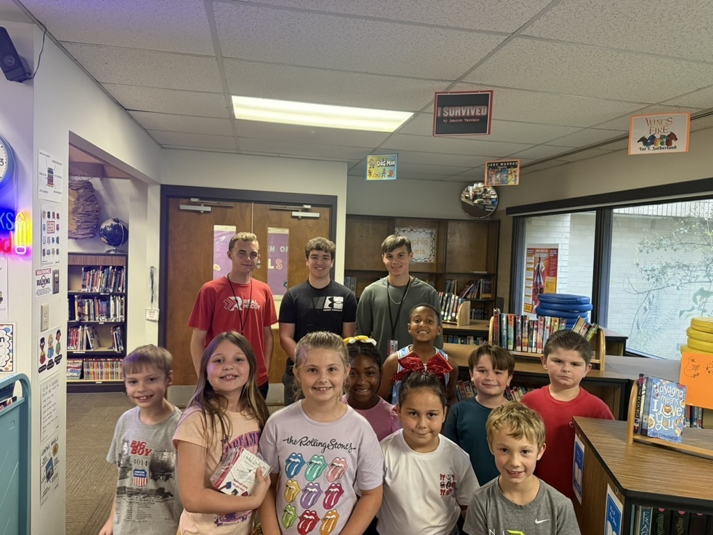 The WHHS Chick-Fil-A Leader Academy members donated books to our elementary school students and read to them.
