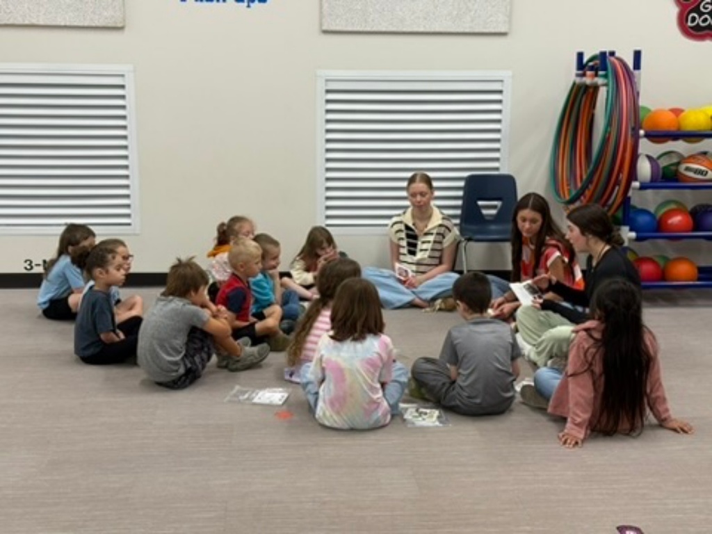 The WHHS Chick-Fil-A Leader Academy members donated books to our elementary school students and read to them.