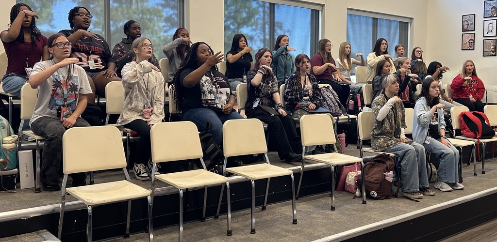 Mrs. Roberts's choir students are practicing sight-reading.