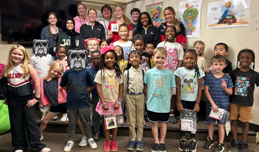 The WHHS Chick-Fil-A Leader Academy members donated books to our elementary school students and read to them.