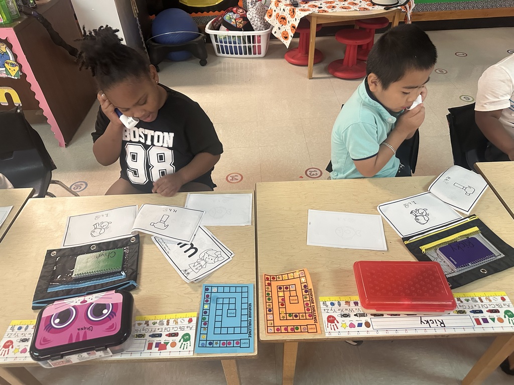 Students using whisper phones