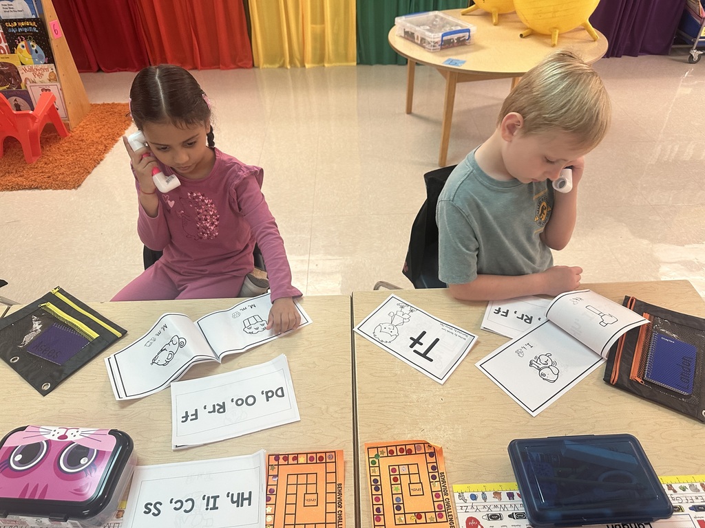 Students using whisper phones