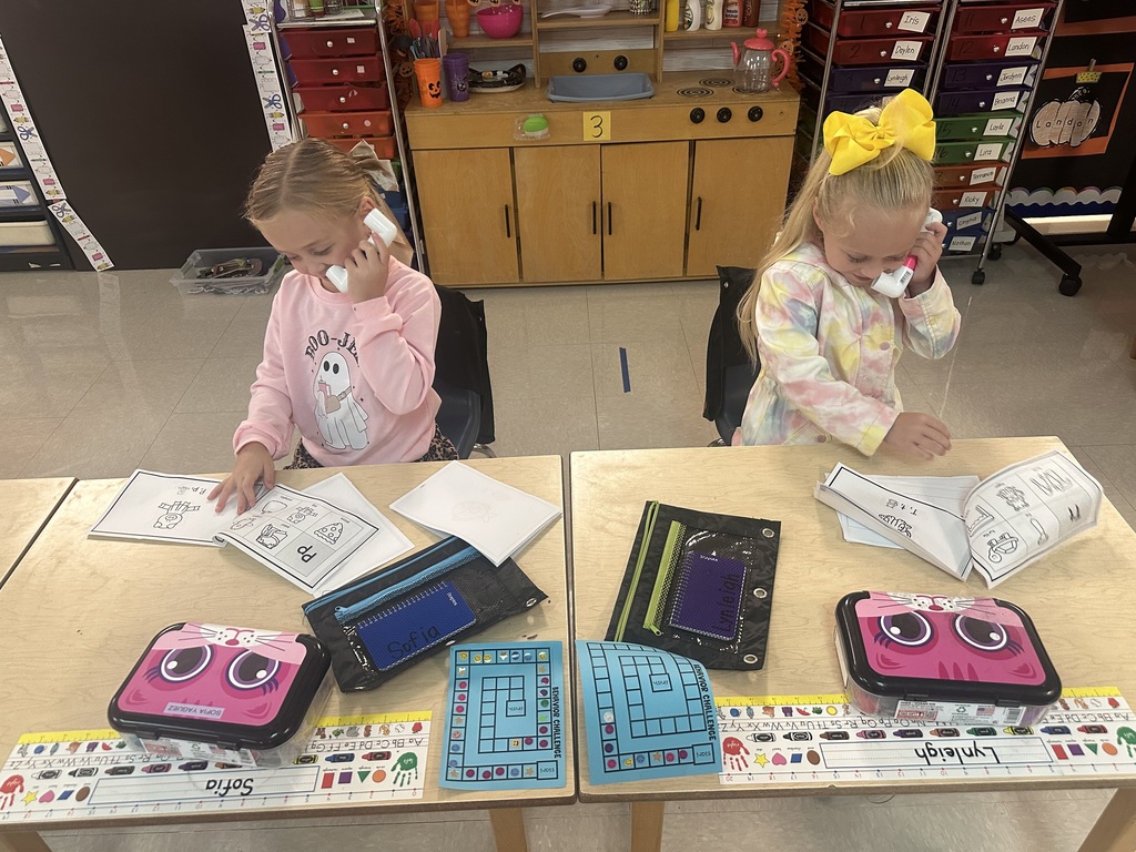 Students using whisper phones