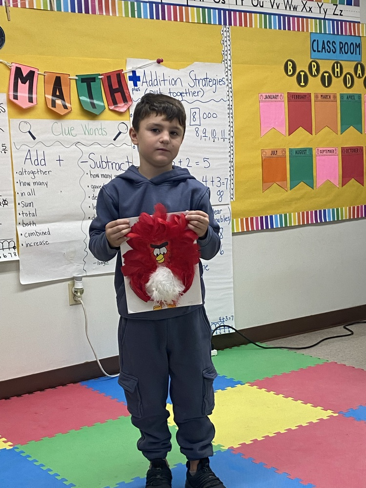 First grade read the book Turkey Trouble and had a home project to disguise their turkey. Today they presented their turkey and explained why they chose that disguise.