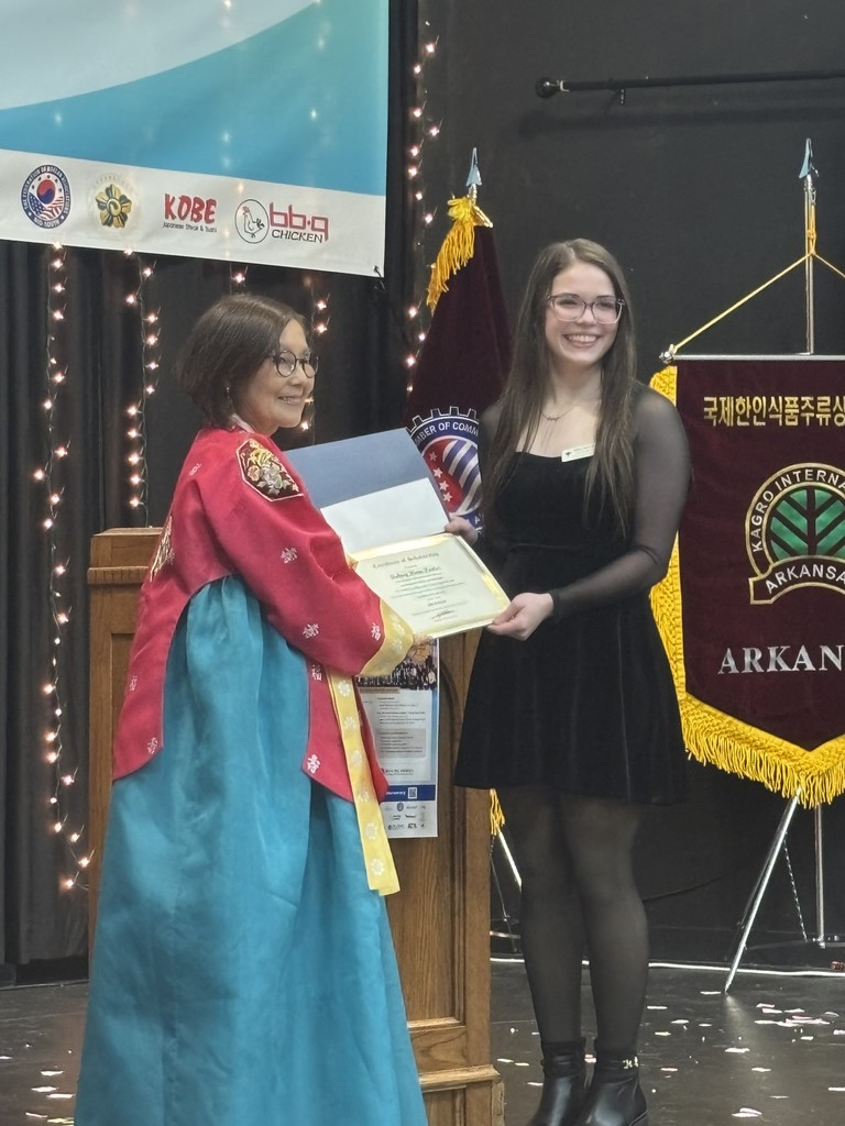 Aubrey Parker, WHHS student, receiving scholarship