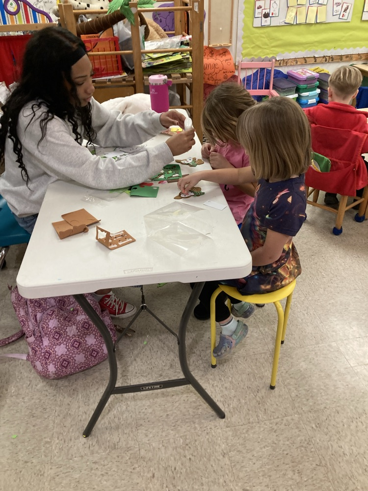 Ms. Taylor from the high school visited and helped us make Christmas ornaments. 