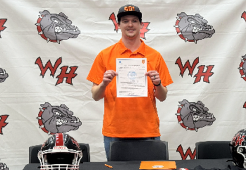 Wyatt Golden signed his "letter of intent" to play football for Hendrix College.