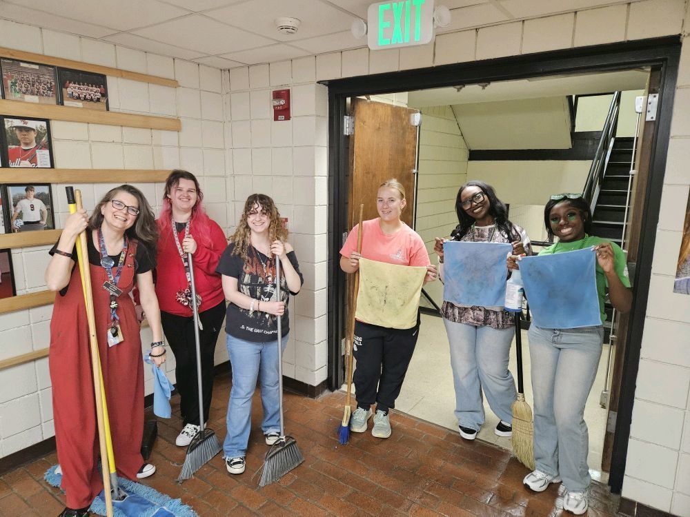 Teams united to clean the school.