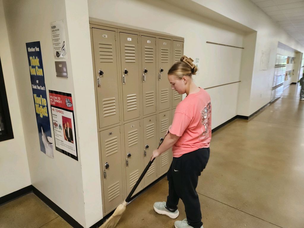 Teams united to clean the school.