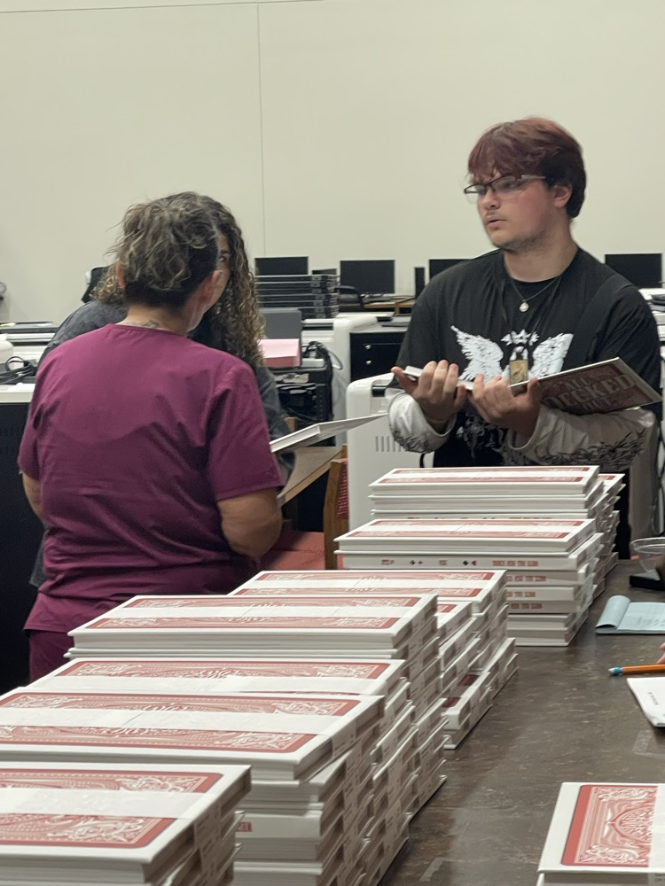 Yearbook pickup and signing event at WHHS.