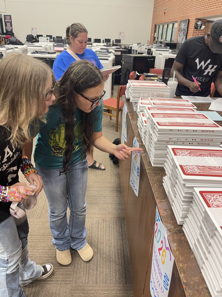 Yearbook pickup and signing event at WHHS.