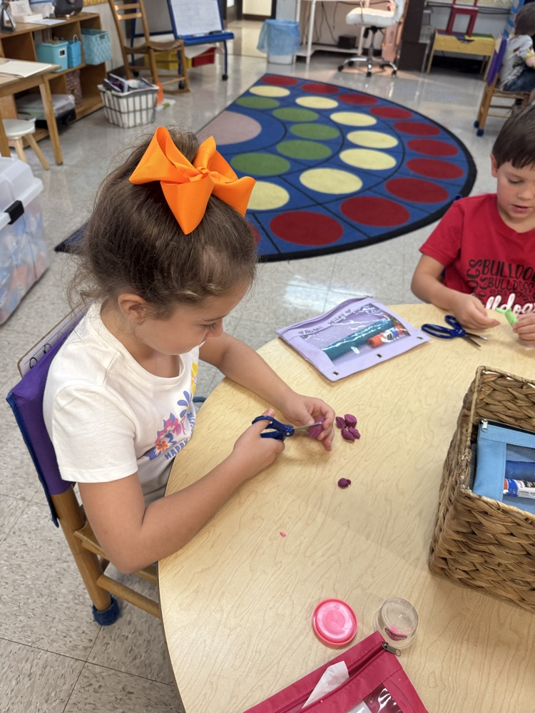 Cutting practice with Play doh in Mrs. Vernor’s class.