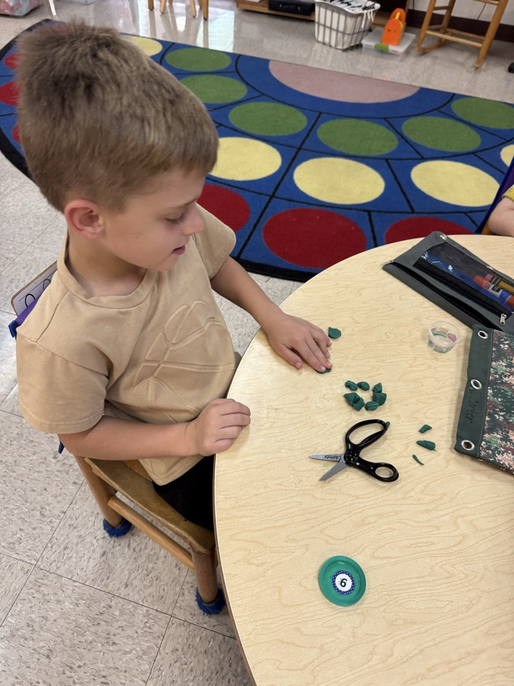 Cutting practice with Play doh in Mrs. Vernor’s class.