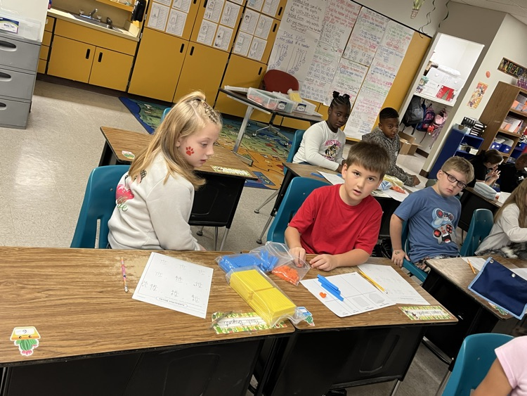 Teamwork: Subtraction with regrouping 