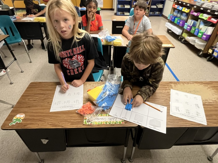 Teamwork: Subtraction with regrouping 