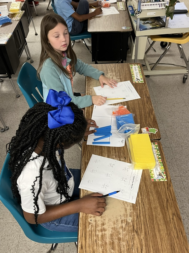 Teamwork: Subtraction with regrouping 