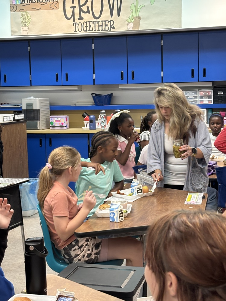  Mrs. Addison talked about canning food. And brought some bread and butter pickles and salsa that she canned for the Great Girls to try. 