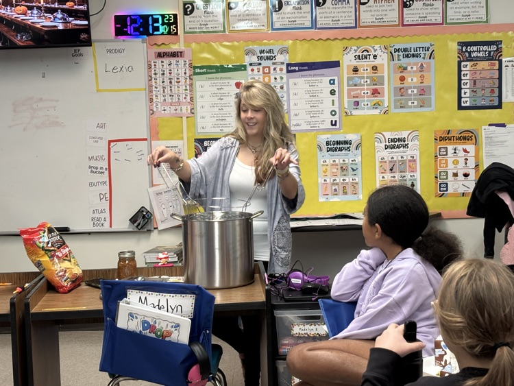  Mrs. Addison talked about canning food. And brought some bread and butter pickles and salsa that she canned for the Great Girls to try. 