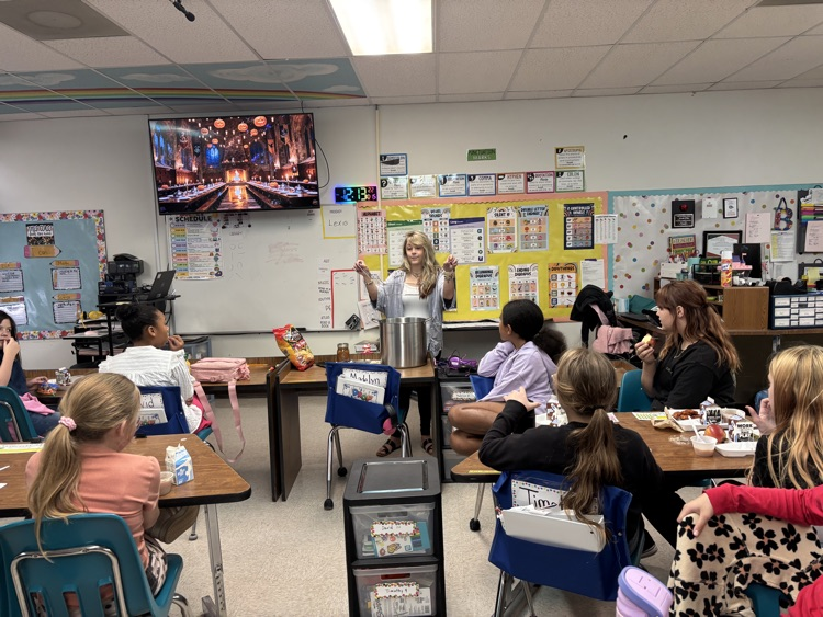  Mrs. Addison talked about canning food. And brought some bread and butter pickles and salsa that she canned for the Great Girls to try. 