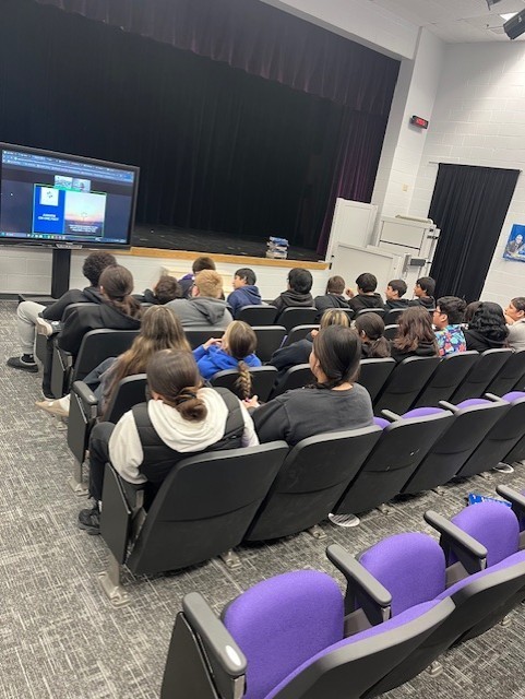 8th graders listening to our speaker.