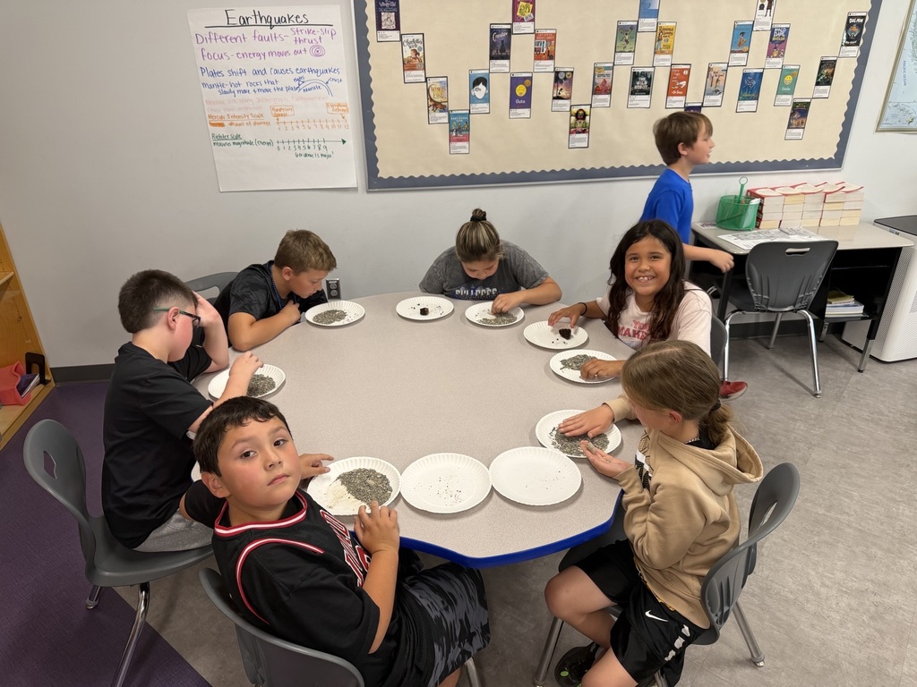 4th grade looking at fossils.