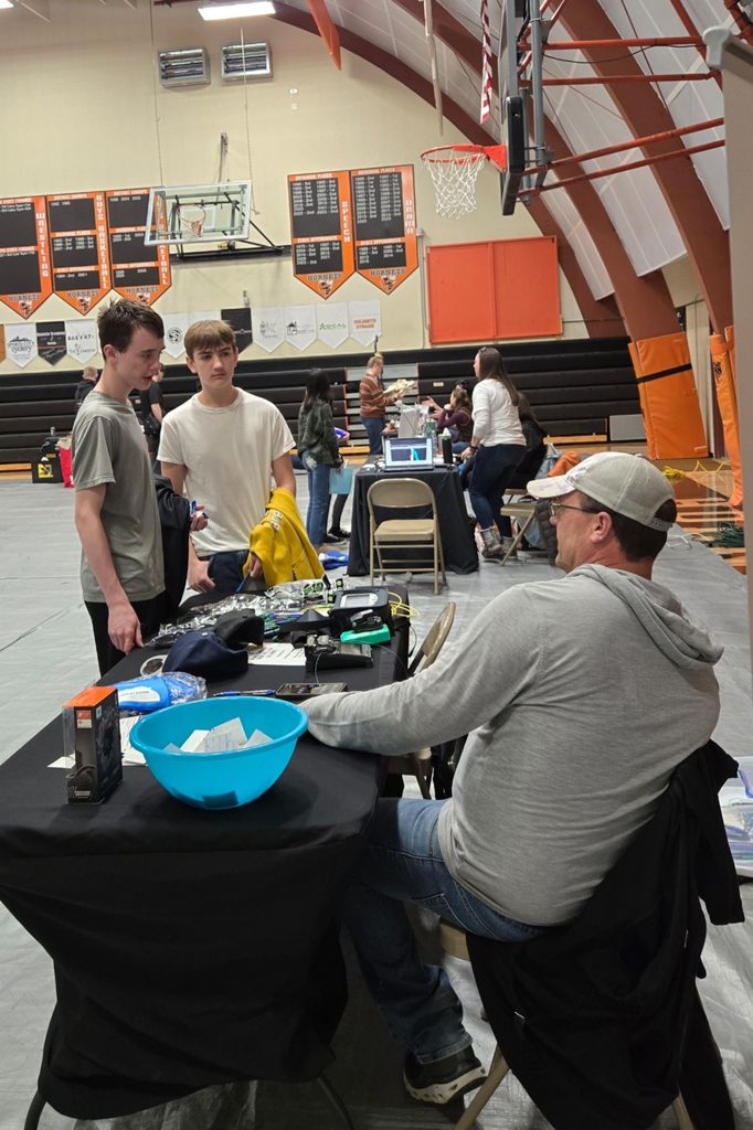 Students visit with one of our career fair guests.