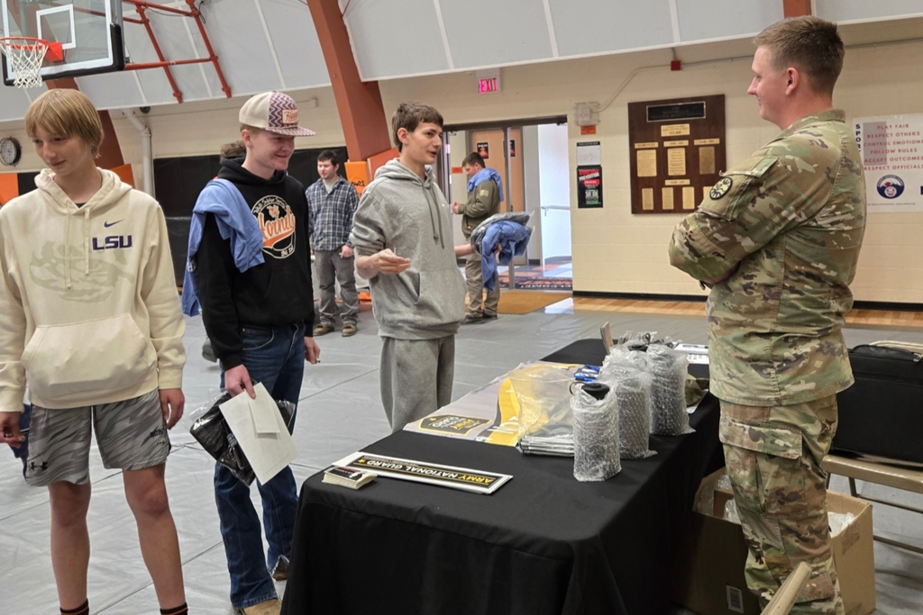 Students visit with one of our career fair guests.