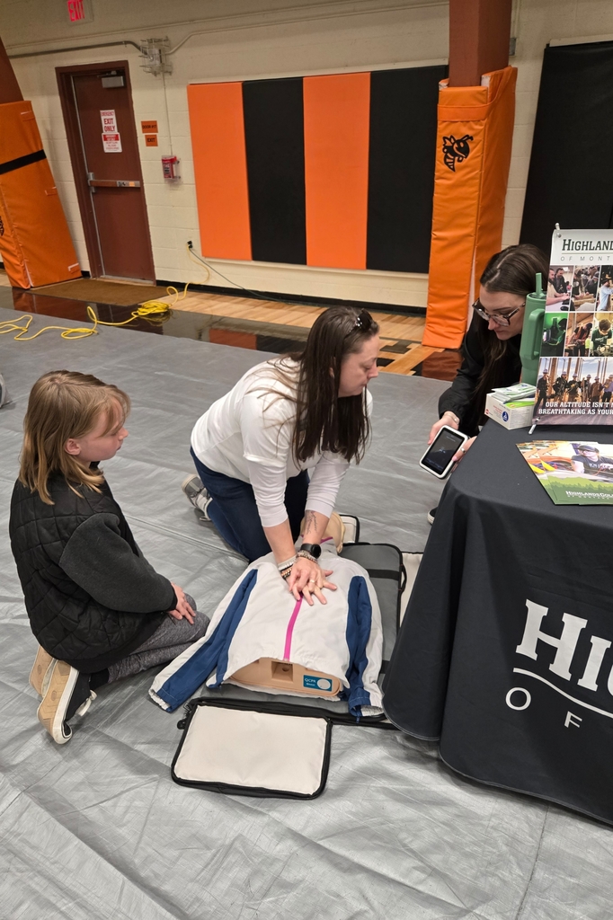 Students visit with one of our career fair guests.