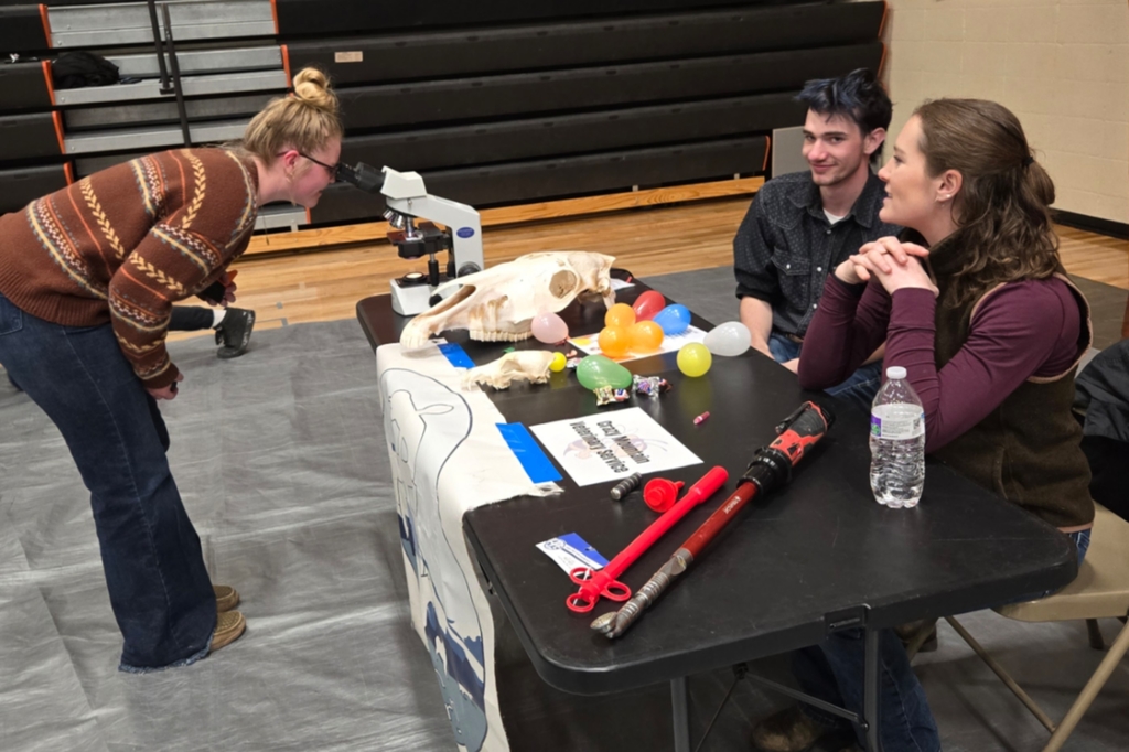 Students visit with one of our career fair guests.
